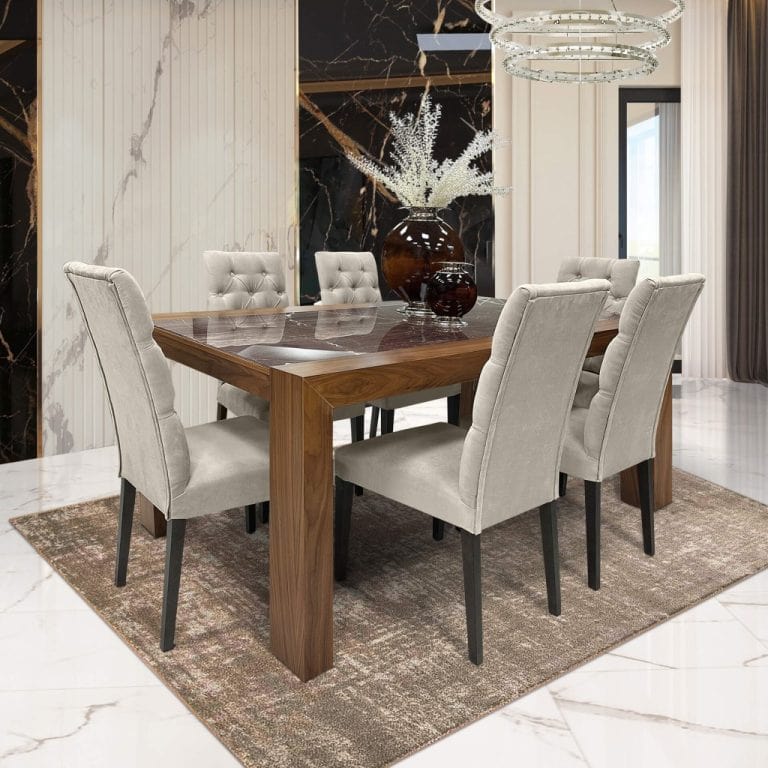 Wooden dining room set made of walnut tree. Chairs with grey fabric upholstery around the table.