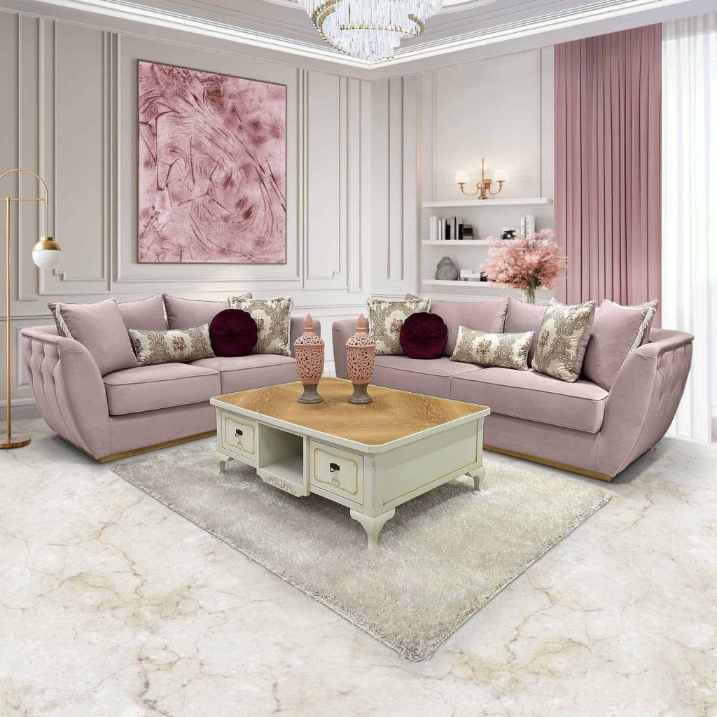 Thematic image about what the best fabrics for sofas are. Living room with two sofas in pale pink.